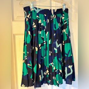 Classic pleated skirt with beautiful jewel tone colors.